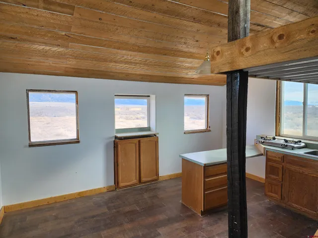 a view of an empty room and window