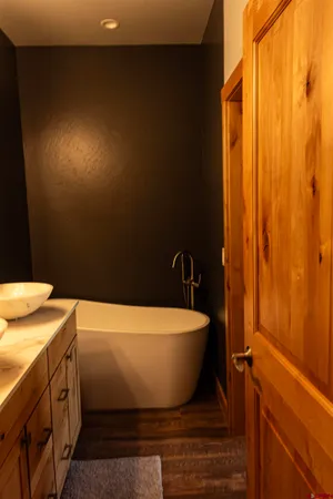 a view of a bathtub in a bathroom
