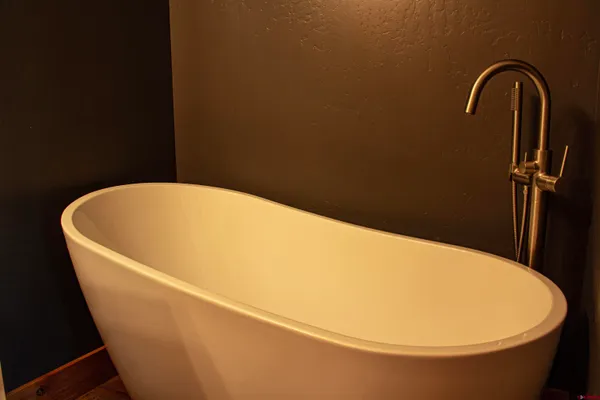 a view of a bathtub in a bathroom
