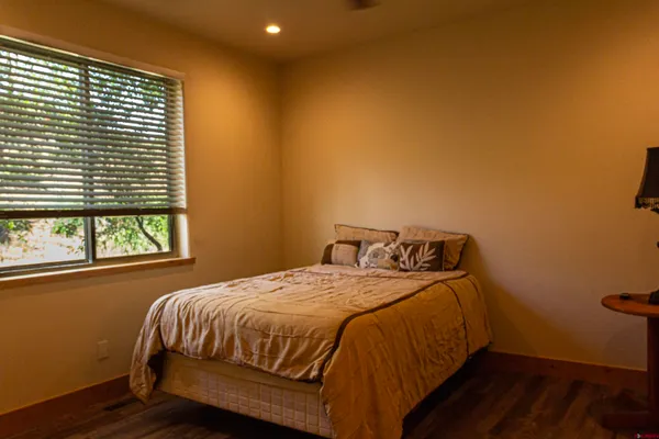 a view of a livingroom with wooden floor