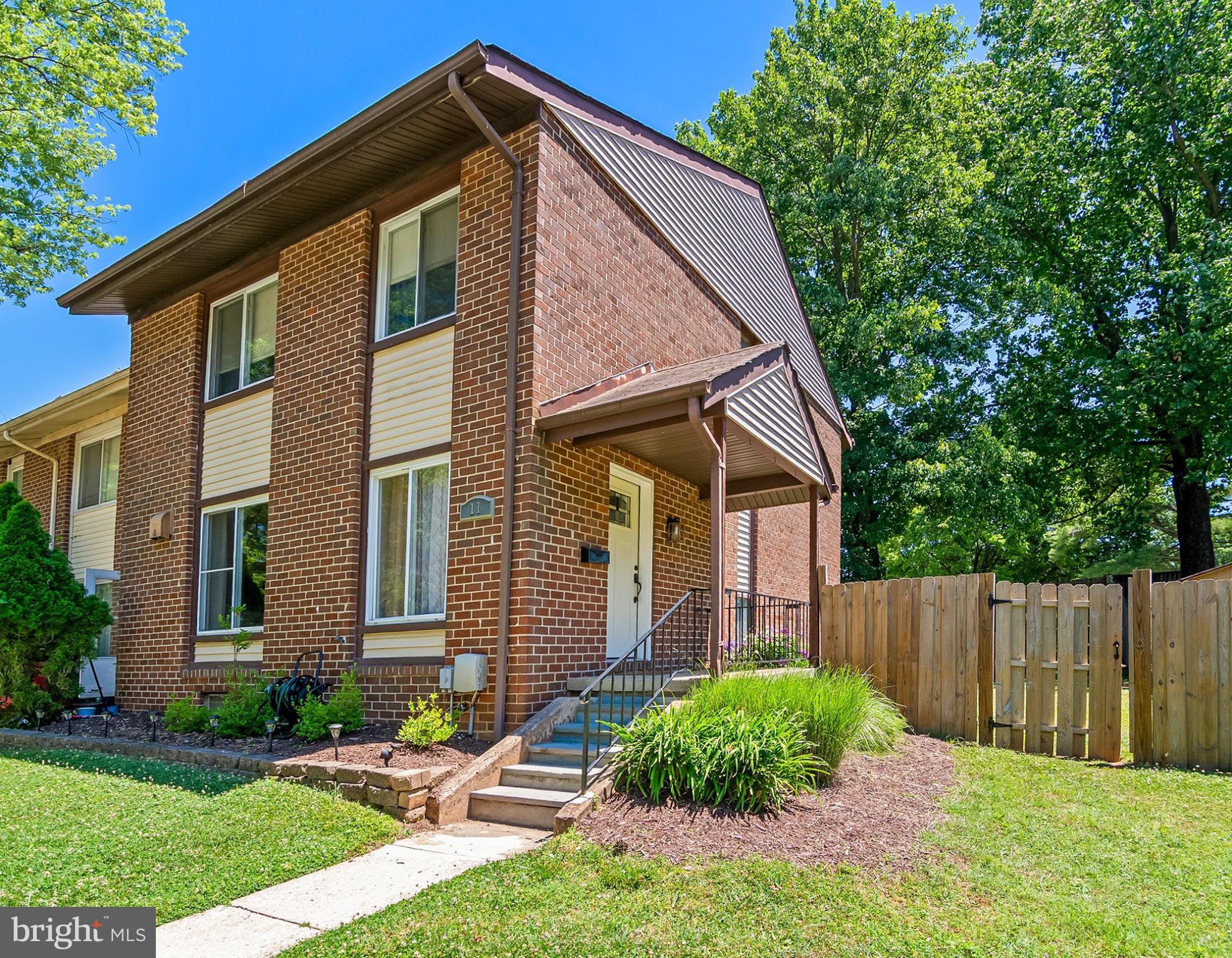 11 Strabane Court Baltimore, MD 21234 - Photo 8 of 45 Charming brick home with lush greenery.