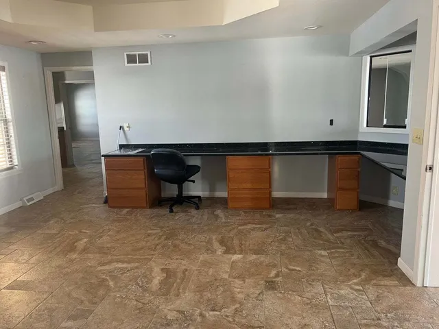 an empty room with windows