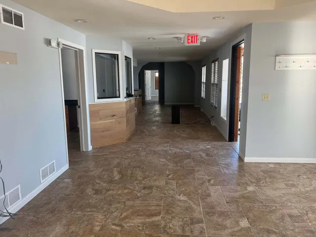 a view of gallery with hallway