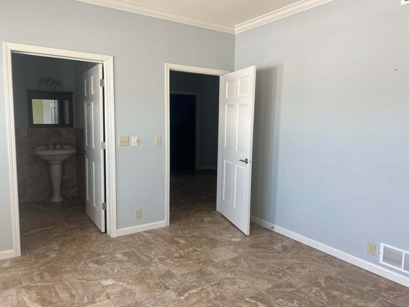 4824 Green Bay Road Kenosha, WI 53144 - Photo 8 of 13 an empty room with closet and a bathroom