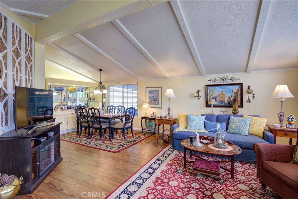 1675 Los Osos Valley Road, Unit 223 Los Osos, CA 93402 - Photo 18 of 68 a living room with furniture and a flat screen tv
