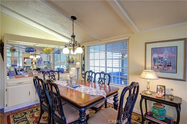 a kitchen with stainless steel appliances a sink and a stove top oven