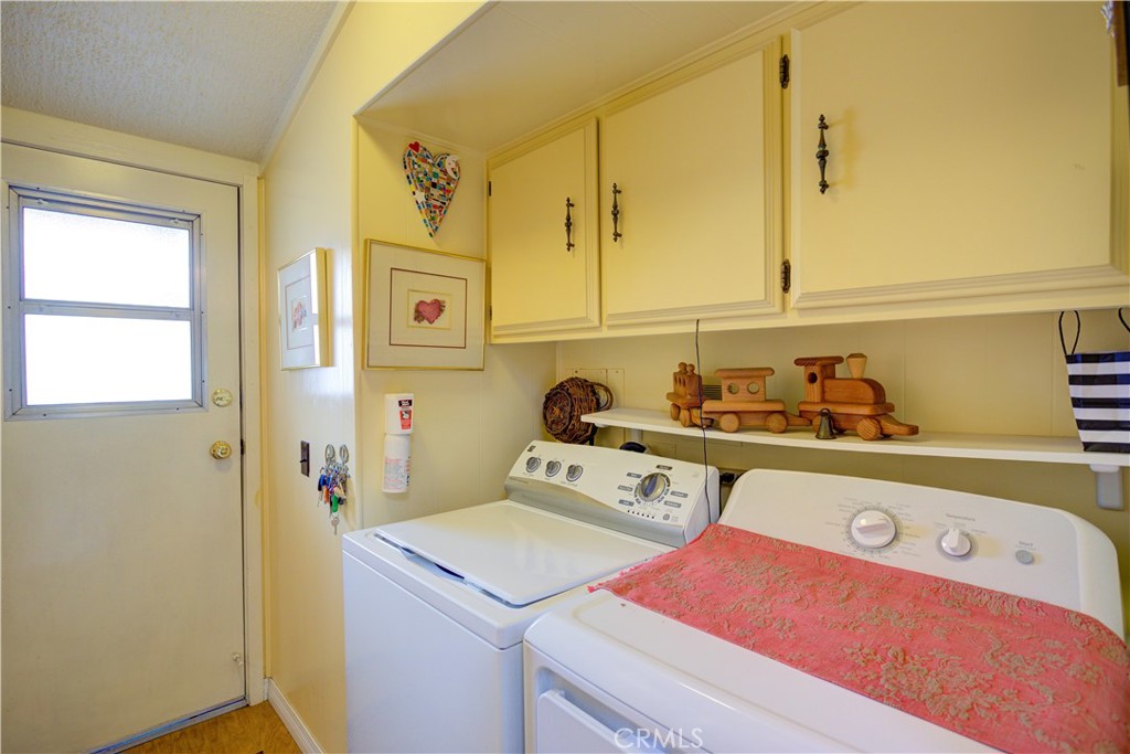1675 Los Osos Valley Road, Unit 223 Los Osos, CA 93402 - Photo 33 of 68 a utility room with dryer and washer
