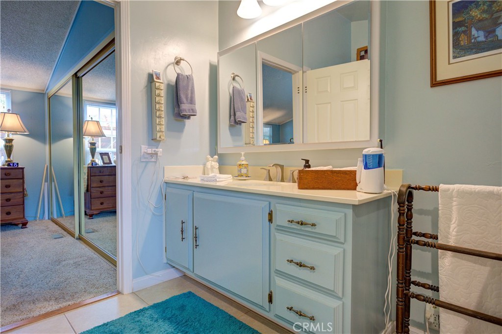 1675 Los Osos Valley Road, Unit 223 Los Osos, CA 93402 - Photo 44 of 68 a bathroom with a double vanity sink mirror and