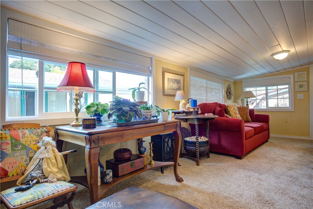 1675 Los Osos Valley Road, Unit 223 Los Osos, CA 93402 - Photo 48 of 68 a living room with furniture and a window
