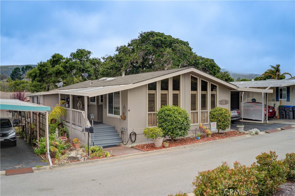 1675 Los Osos Valley Road, Unit 223 Los Osos, CA 93402 - Photo 52 of 68 front view of a house with a yard