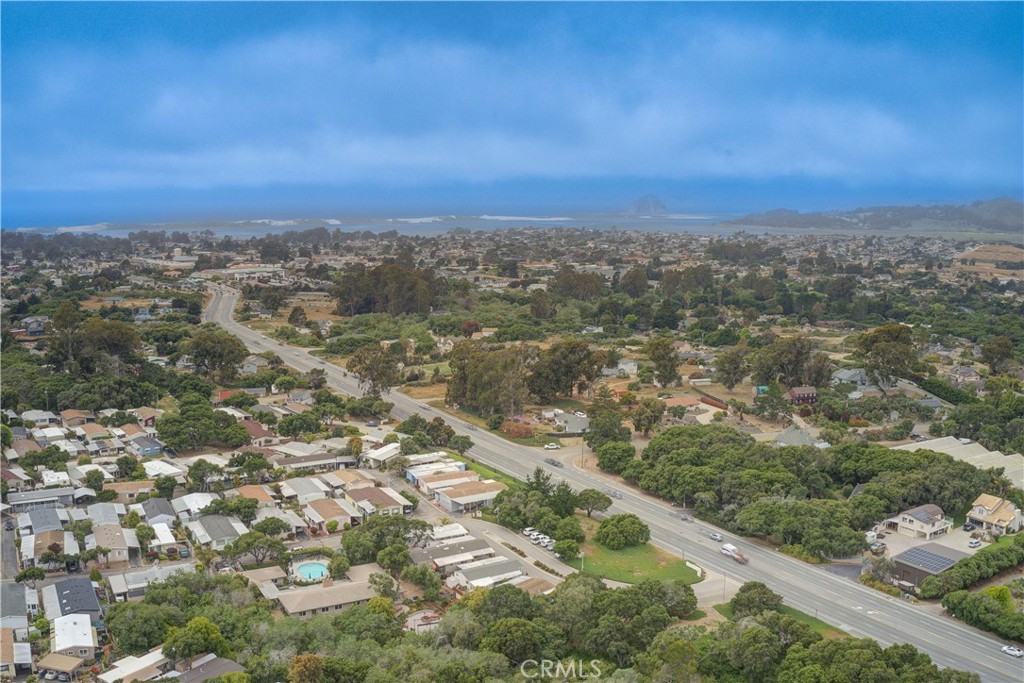 1675 Los Osos Valley Road, Unit 223 Los Osos, CA 93402 - Photo 67 of 68 an aerial view of residential houses with outdoor space and trees