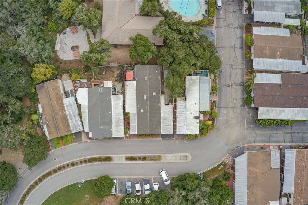 1675 Los Osos Valley Road, Unit 223 Los Osos, CA 93402 - Photo 68 of 68 an aerial view of a house with swimming pool and large trees