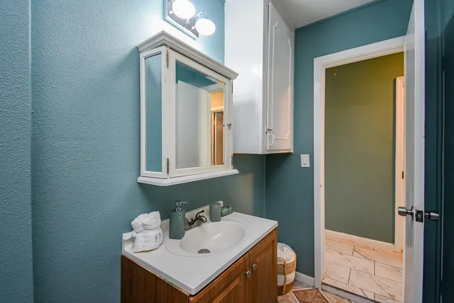 a view of a room with a fan