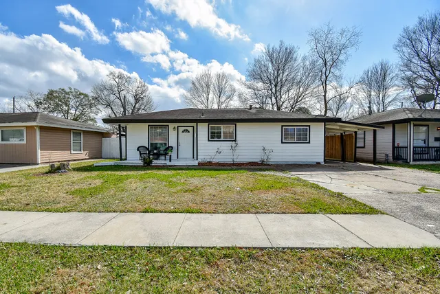 a view of a house with a swimming pool