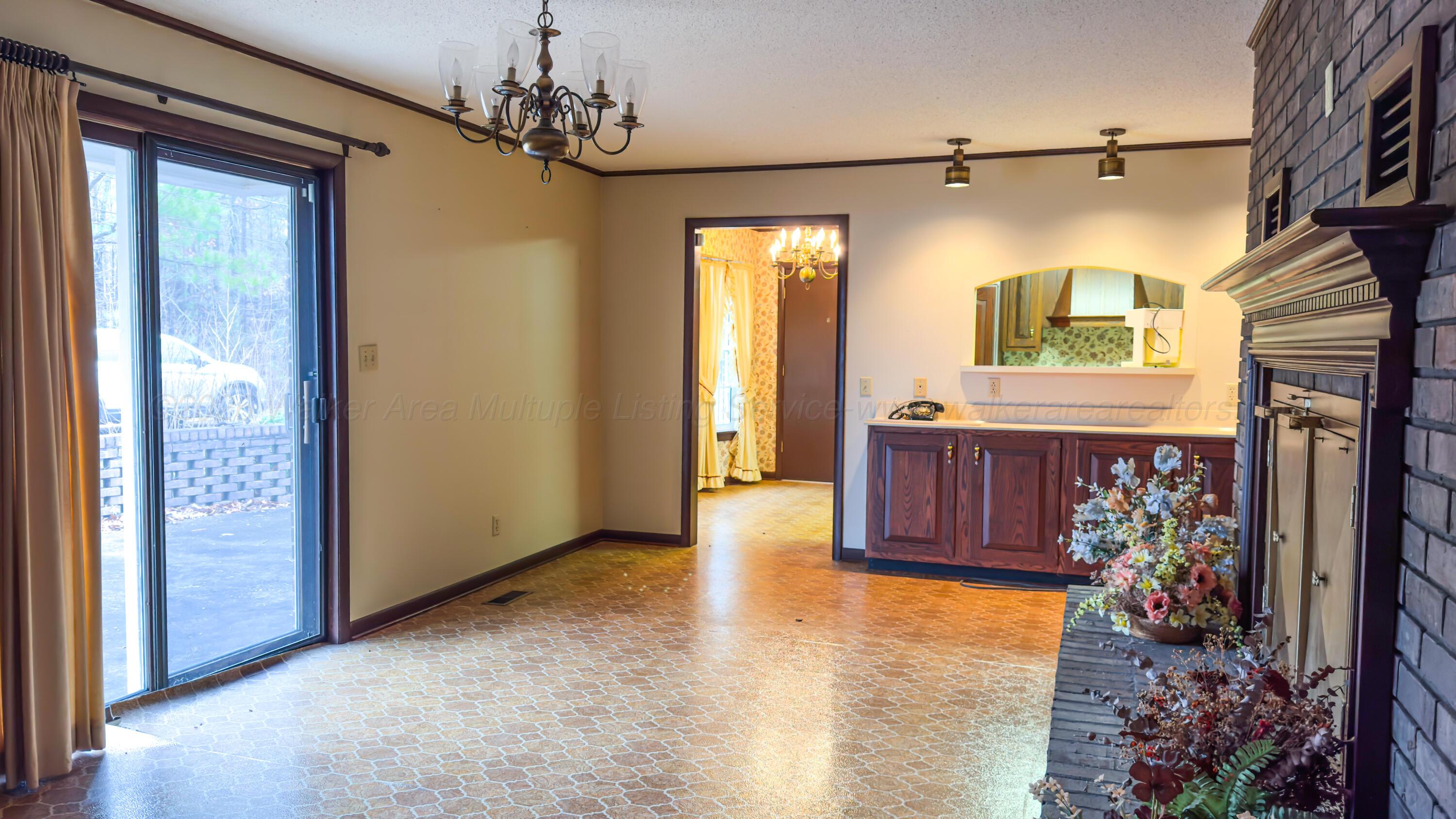1845 Roberts Road Hamilton, AL 35570 - Photo 11 of 47 Dining Room w/ fireplace
