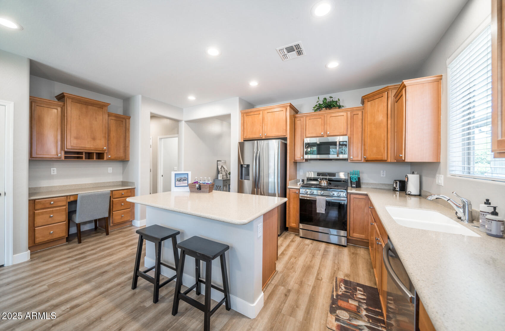 6375 West Heritage Way Florence, AZ 85132 - Photo 13 of 36 a large kitchen with a table and chairs in it