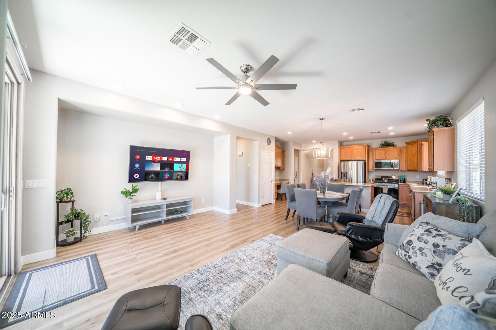 6375 West Heritage Way Florence, AZ 85132 - Photo 19 of 36 a living room with furniture and a flat screen tv