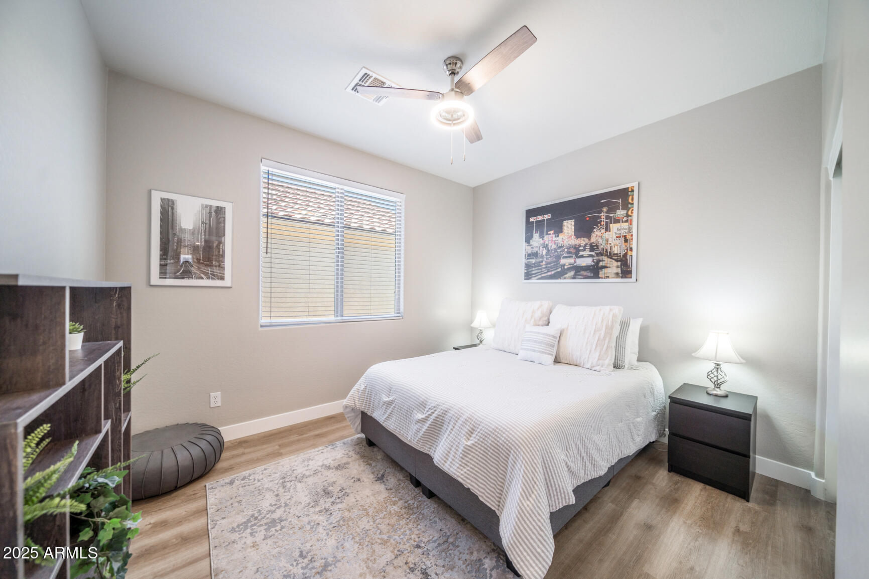 6375 West Heritage Way Florence, AZ 85132 - Photo 20 of 36 a bedroom with a large bed and a window