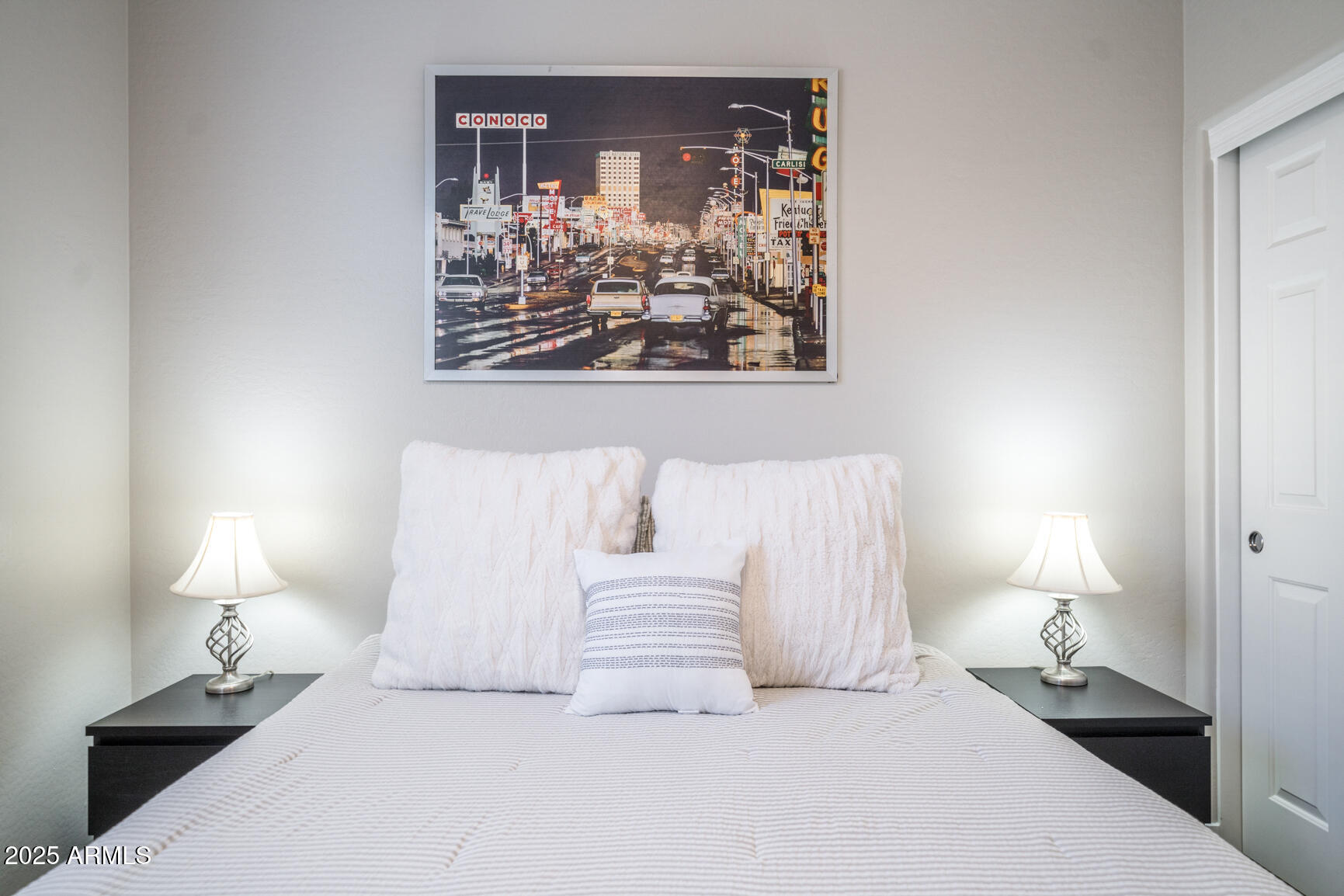 6375 West Heritage Way Florence, AZ 85132 - Photo 22 of 36 a bedroom with a bed and a lamp
