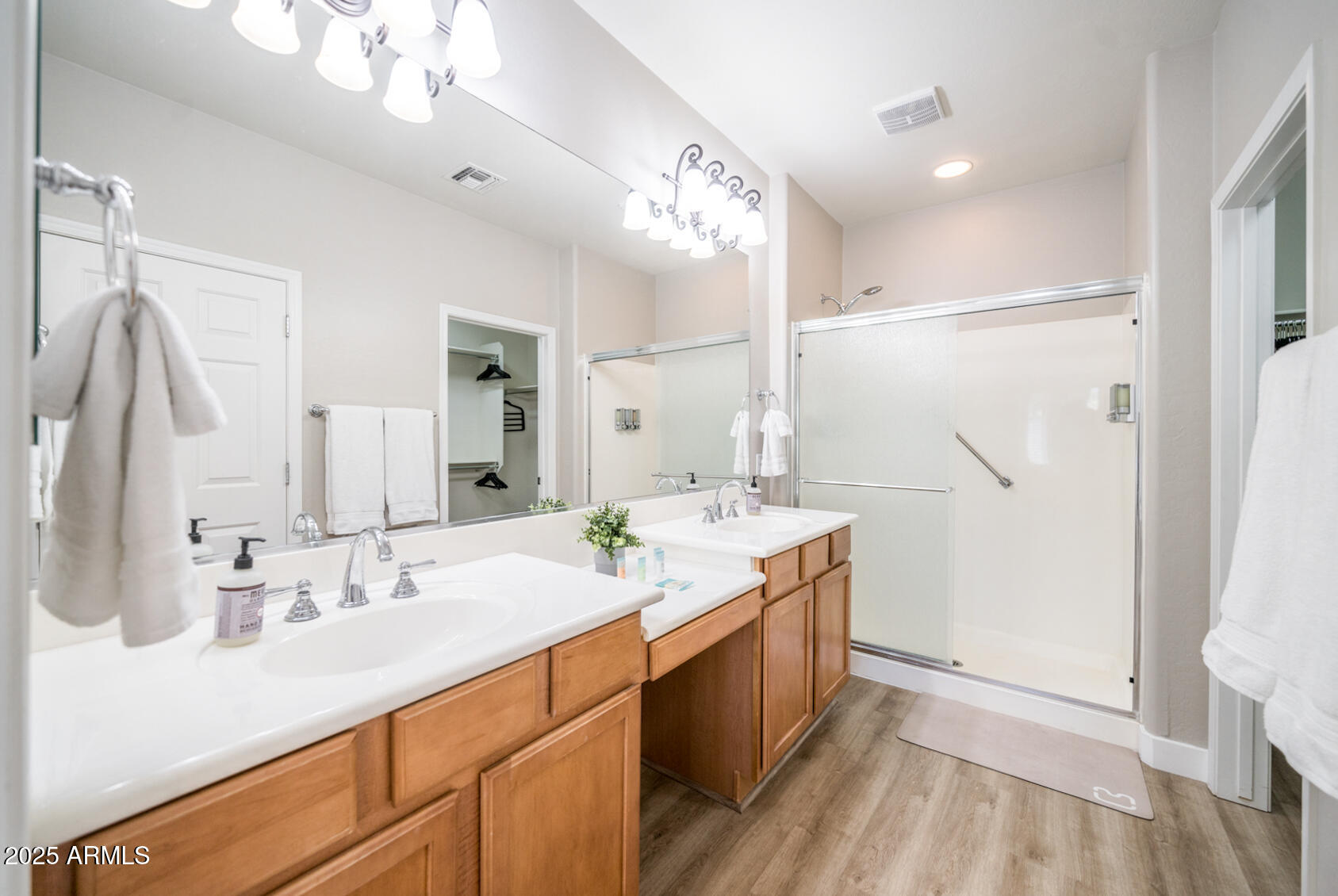 6375 West Heritage Way Florence, AZ 85132 - Photo 29 of 36 a bathroom with a double vanity sink mirror and double