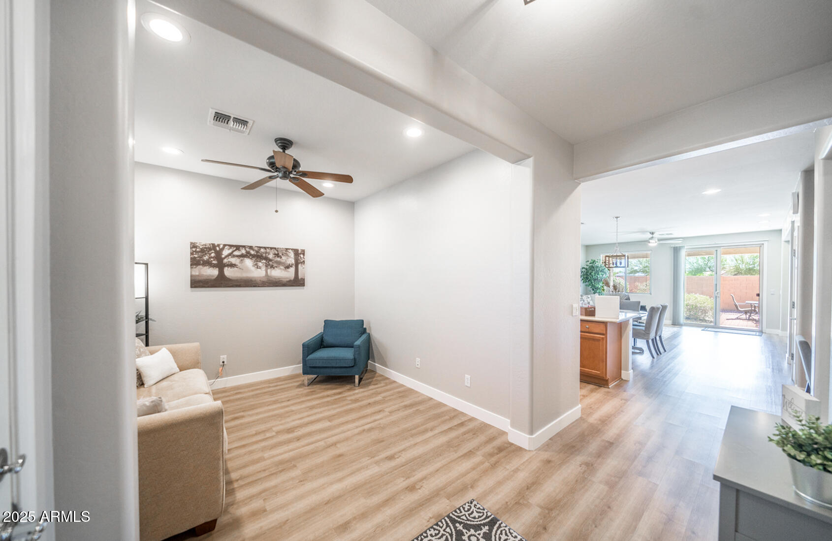 6375 West Heritage Way Florence, AZ 85132 - Photo 3 of 36 a view of a living room and dining room