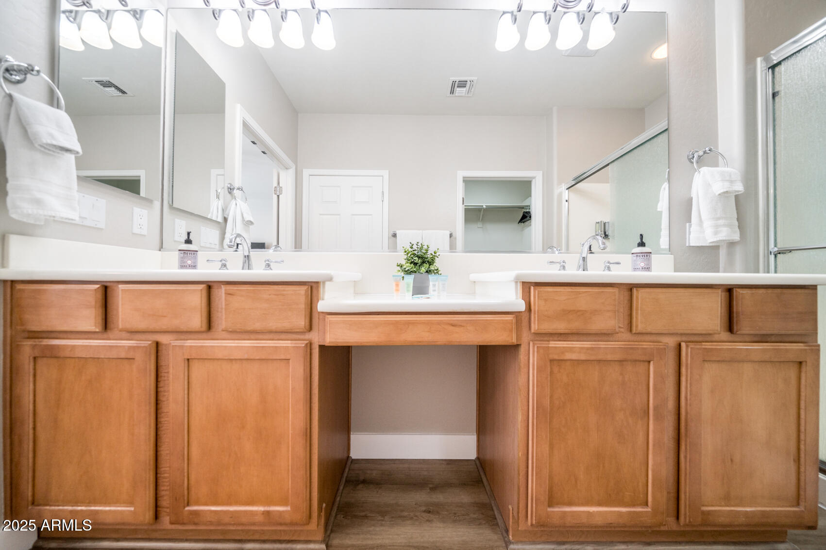 6375 West Heritage Way Florence, AZ 85132 - Photo 31 of 36 a bathroom with a sink a mirror and a vanity