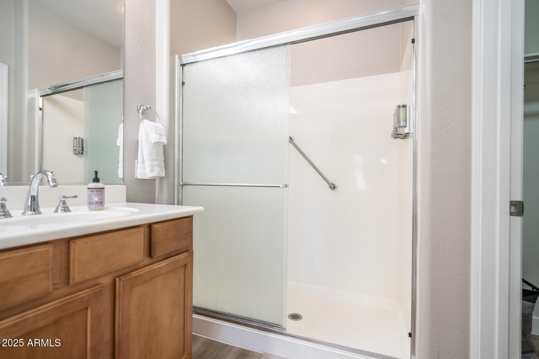 6375 West Heritage Way Florence, AZ 85132 - Photo 32 of 36 a bathroom with a sink and a mirror