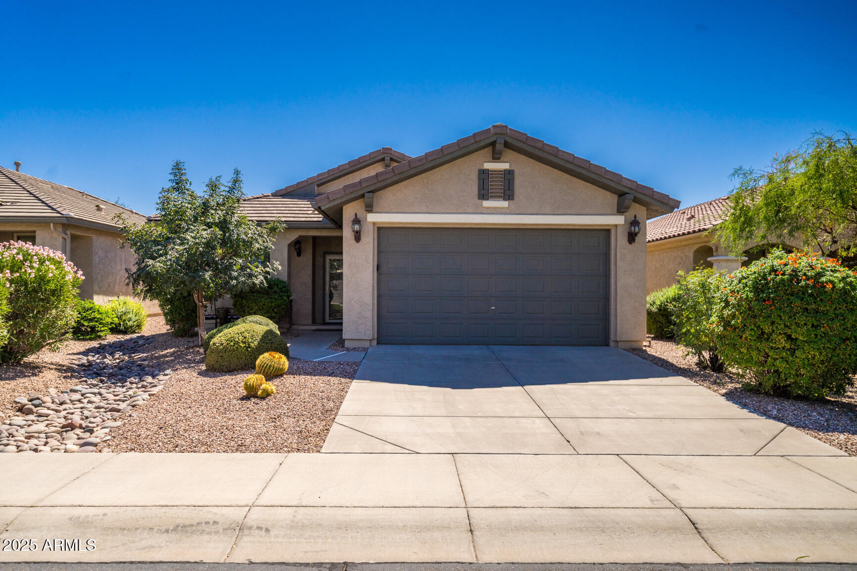 6375 West Heritage Way Florence, AZ 85132 - Photo 36 of 36 a front view of a house with garden