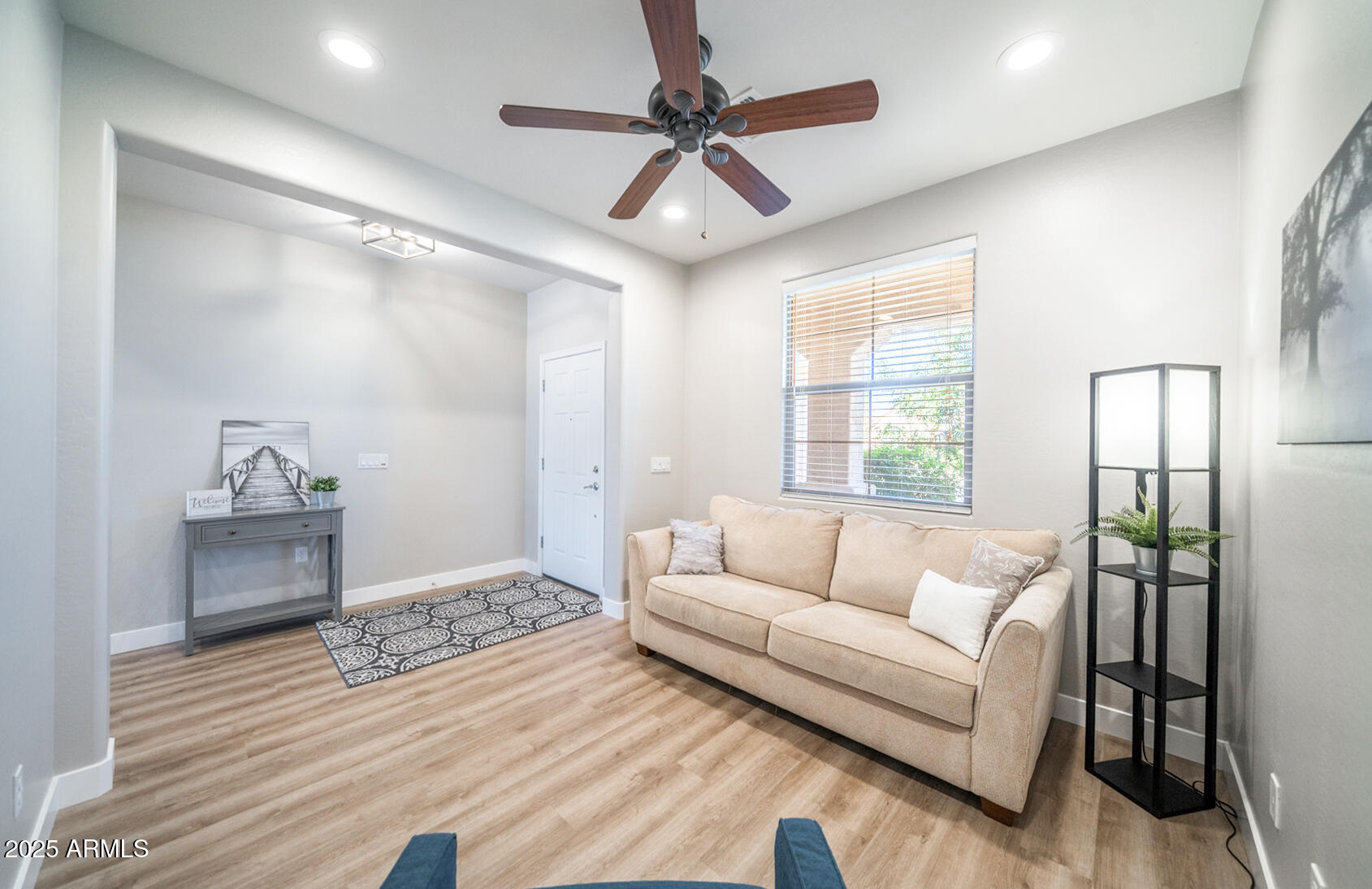6375 West Heritage Way Florence, AZ 85132 - Photo 5 of 36 a living room with furniture and a window