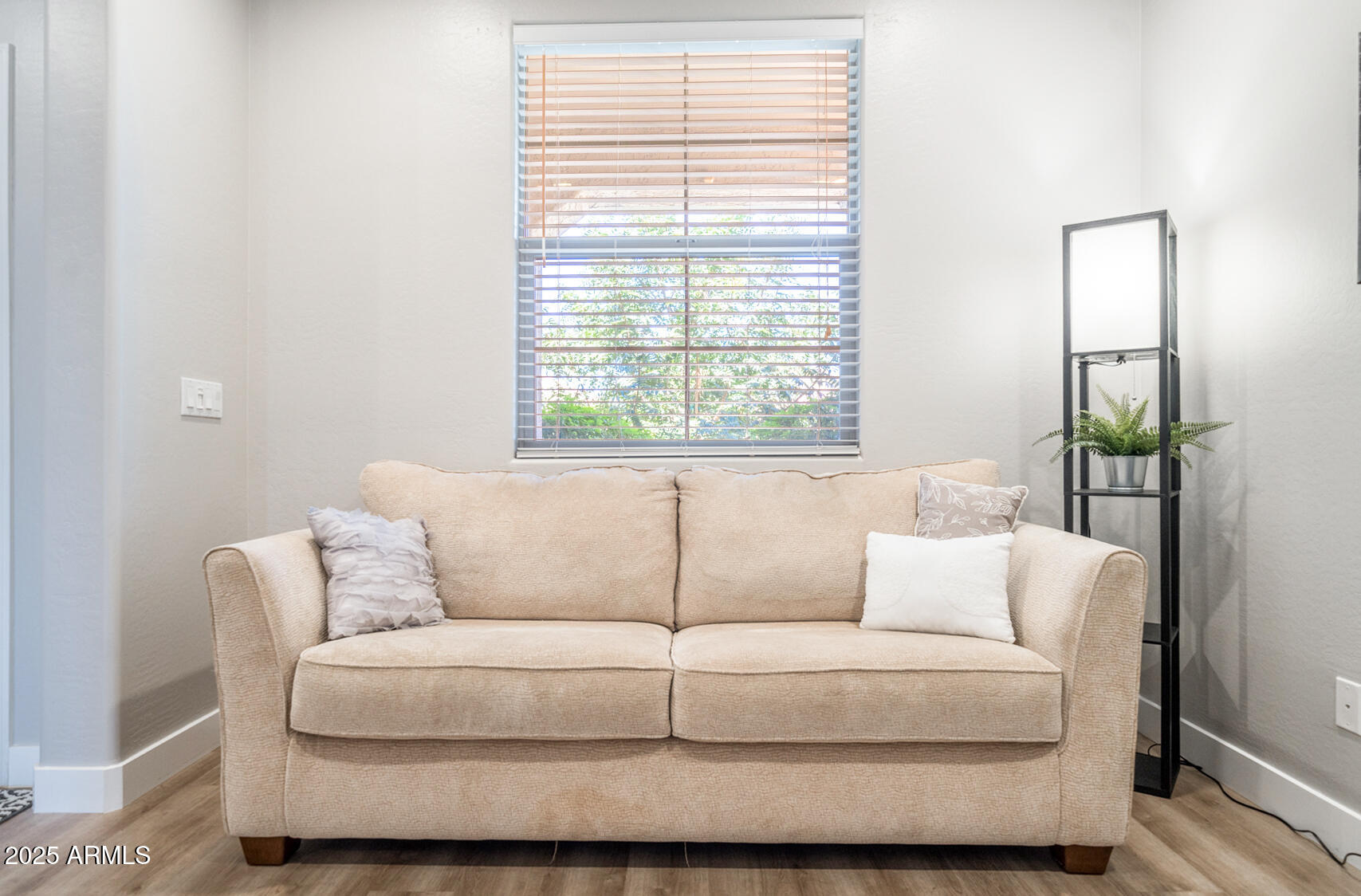 6375 West Heritage Way Florence, AZ 85132 - Photo 6 of 36 a living room with furniture and a window
