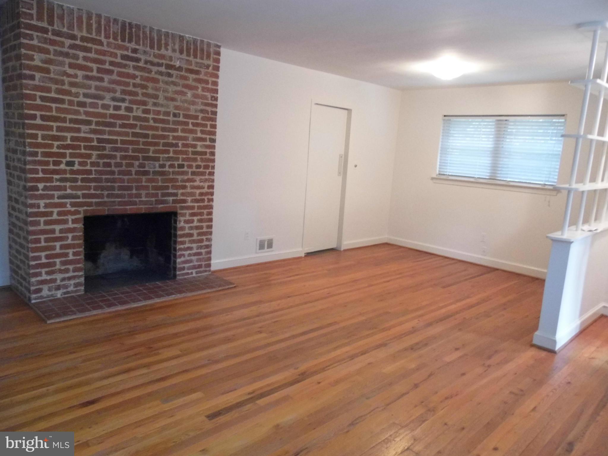 303 East Schuyler Road Silver Spring, MD 20901 - Photo 2 of 16 Living Room/Dining Area