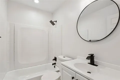 a close view of light fixtures and a window in a room