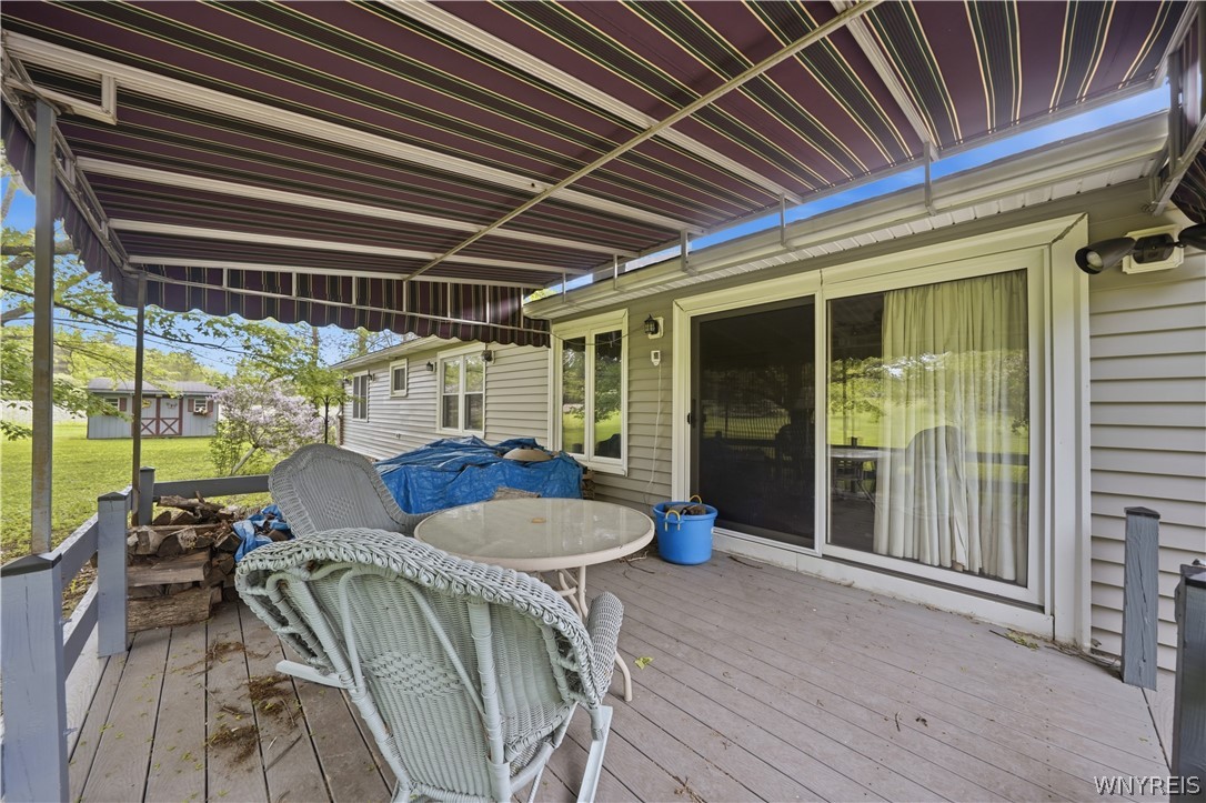 9950 Harper Road Darien, NY 14036 - Photo 10 of 50 Covered rear deck