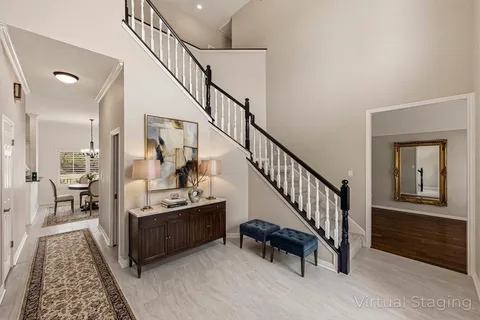 a view of a hallway view with staircase