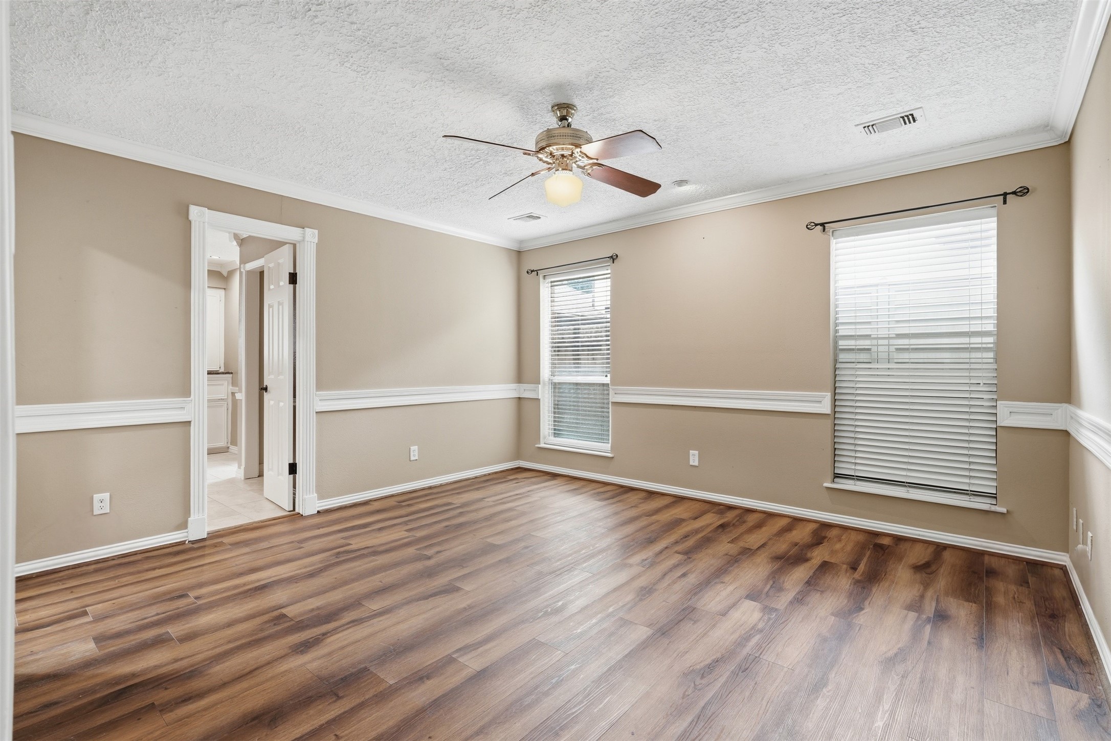8310 Mentmore Drive Spring, TX 77379 - Photo 24 of 47 Escape to the spacious primary suite, offering a peaceful retreat with plenty of room to relax.
