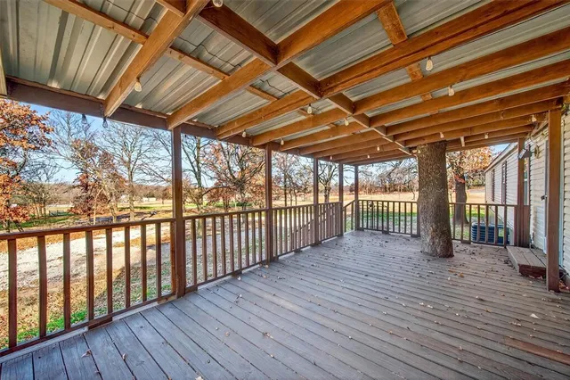 an aerial view of residential building and ocean view