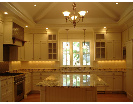 65 Denton Road Wellesley, MA 02482 - Photo 2 of 11 a view of a kitchen with a large window