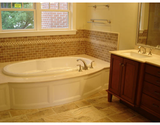 65 Denton Road Wellesley, MA 02482 - Photo 6 of 11 a bathroom with a bathtub and a sink