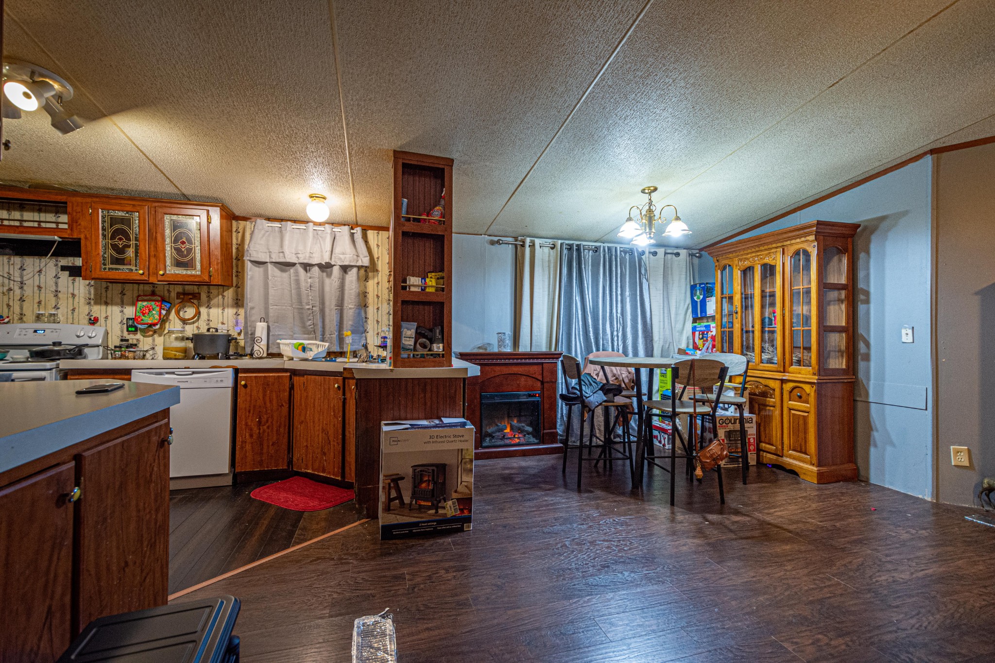 1680 Access Road Pulaski, TN 38478 - Photo 11 of 25 a kitchen with stainless steel appliances granite countertop a refrigerator dining table and chairs