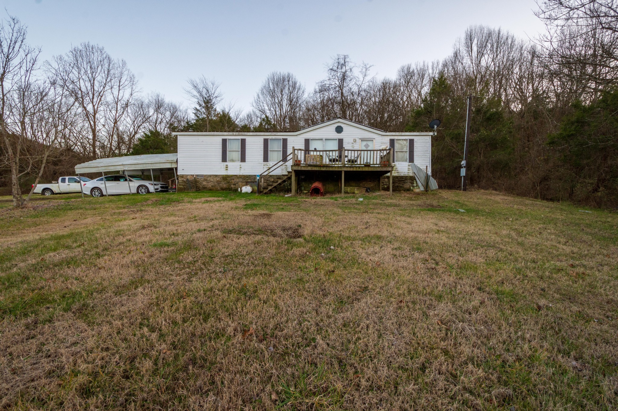 1680 Access Road Pulaski, TN 38478 - Photo 5 of 25 a view of a house with a yard and trees