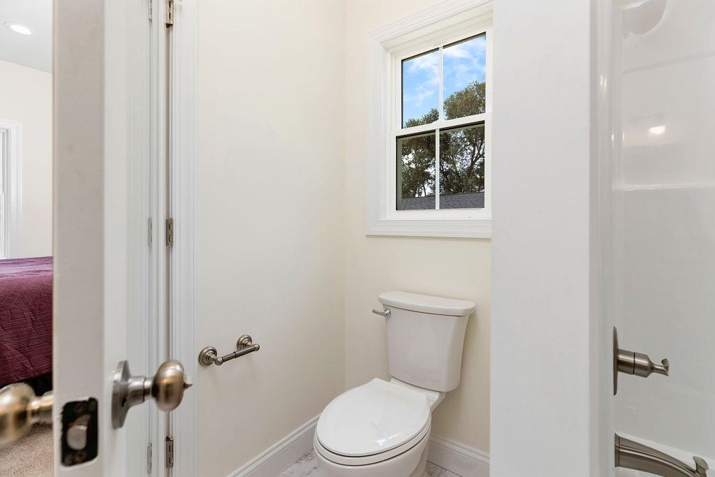 833 Faber Avenue Waynesboro, VA 22980 - Photo 18 of 36 a white toilet sitting next to a bathroom sink