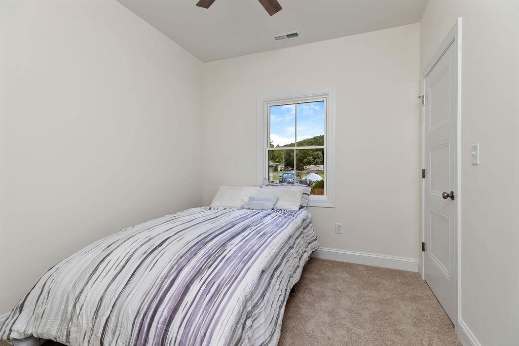 833 Faber Avenue Waynesboro, VA 22980 - Photo 24 of 36 a bedroom with a bed and a window