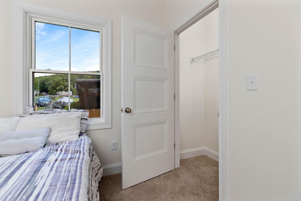 833 Faber Avenue Waynesboro, VA 22980 - Photo 25 of 36 a bedroom with a bed and a couch