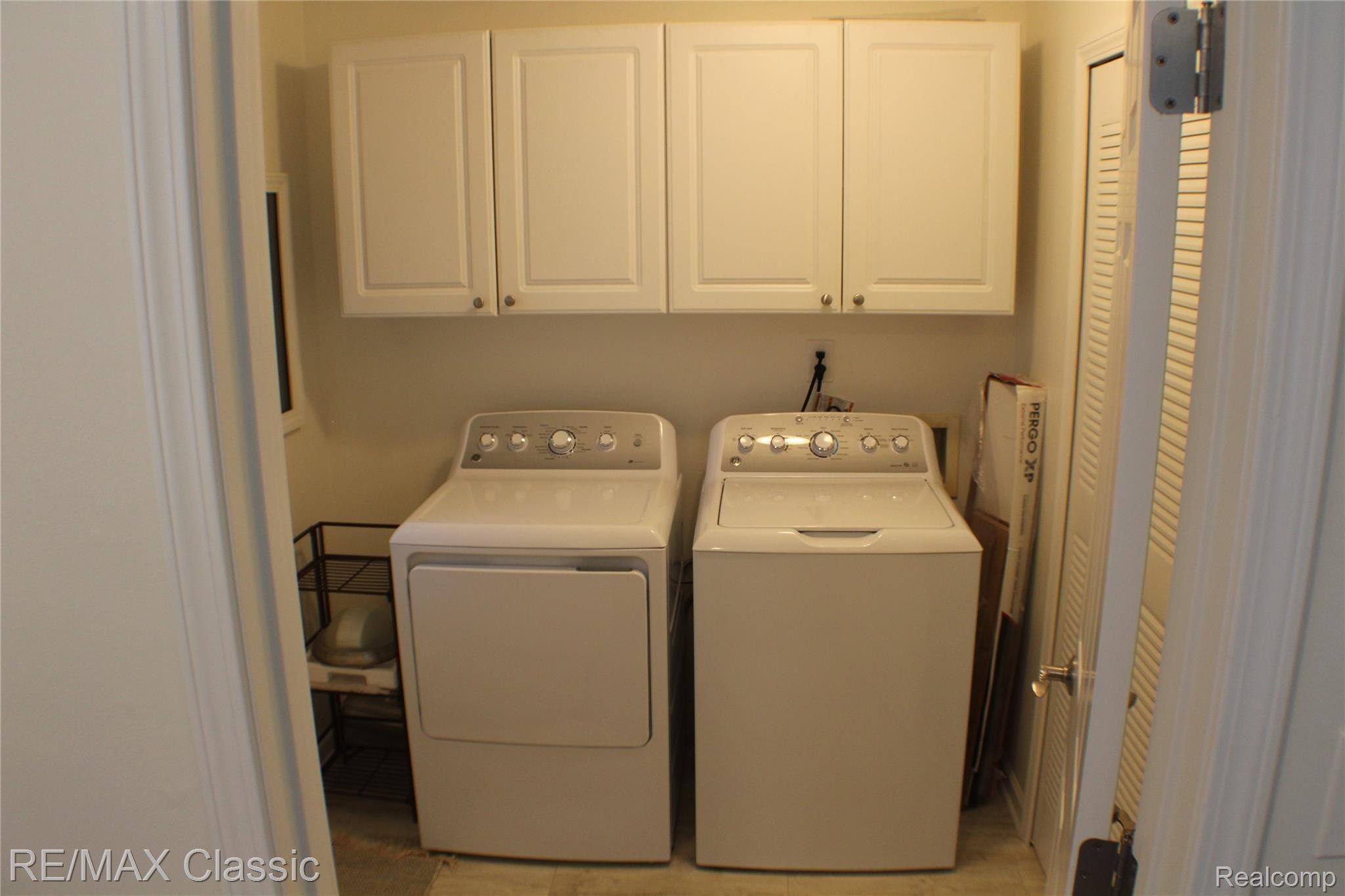 High efficiency washer and dryer with storage