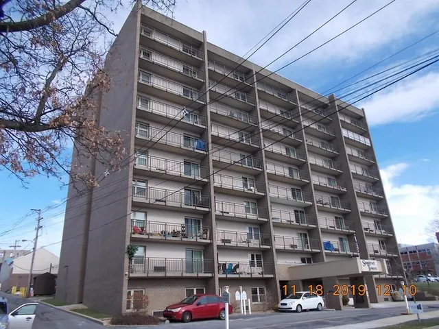 a view of a city with tall buildings