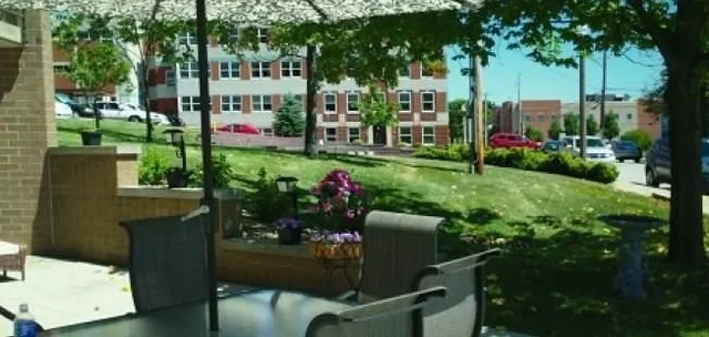 a view of an chairs and tables in the garden