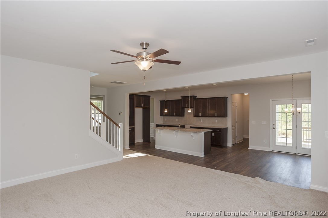454 Pittfield Run Cameron, NC 28326 - Photo 11 of 37 a view of an entryway with wooden floor