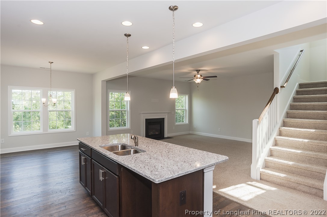 454 Pittfield Run Cameron, NC 28326 - Photo 16 of 37 a kitchen with a sink appliances and a large window