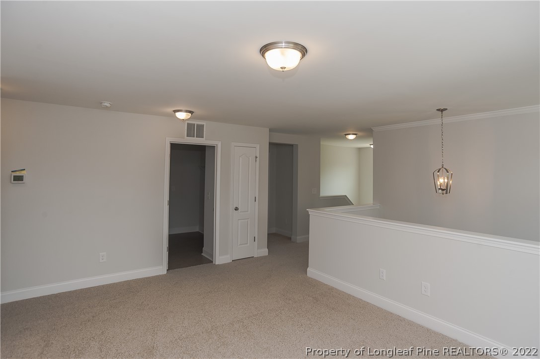 454 Pittfield Run Cameron, NC 28326 - Photo 21 of 37 a view of an empty room