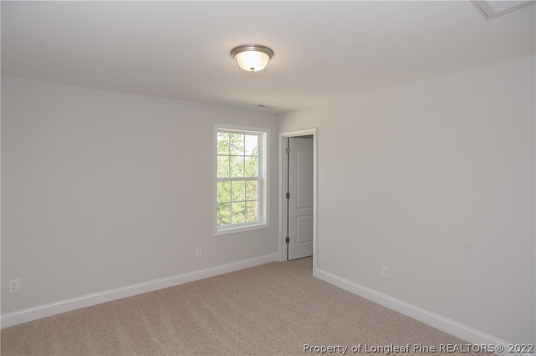 454 Pittfield Run Cameron, NC 28326 - Photo 24 of 37 an empty room with windows